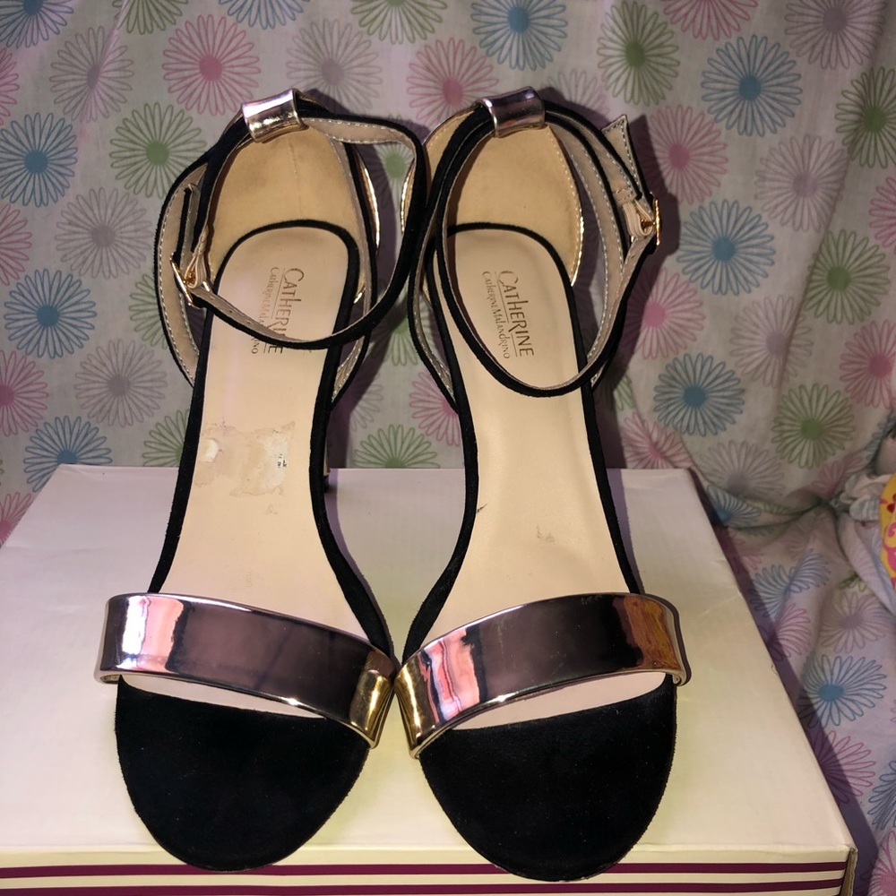 Gold and black heels